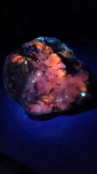 fluorescent granite rock specimen